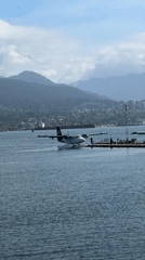 Afternoon waterfront activity documented in Vancouver's Coal Harbour district