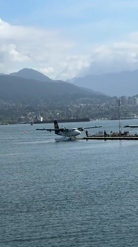 Afternoon waterfront activity documented in Vancouver's Coal Harbour district
