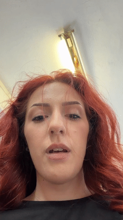 Woman photographed smiling at camera in Bulgarian town