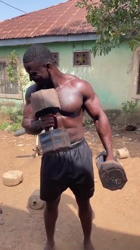 Men hold outdoor weightlifting session in Akwanga, Nigeria