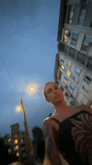 Woman takes selfies while drinking in Pleven, Bulgaria