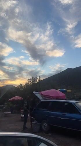 Evening drive captured through Taljarft, Morocco toward mountains