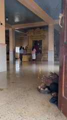 Man prays at Hindu temple in Sri Lanka mountains