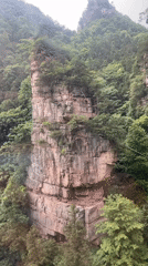 Cable car riders document scenic journey through Zhangjiajie peaks