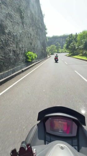Coastal scooter journey documented in South Kuta, Indonesia