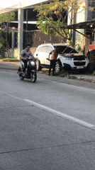 Afternoon traffic flows through a busy street in Boro, Indonesia