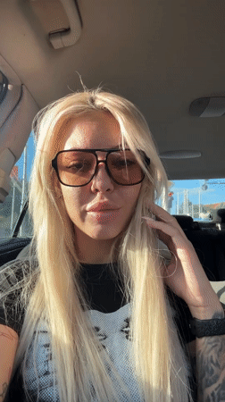 Woman films selfies in car in Plovdiv, Bulgaria