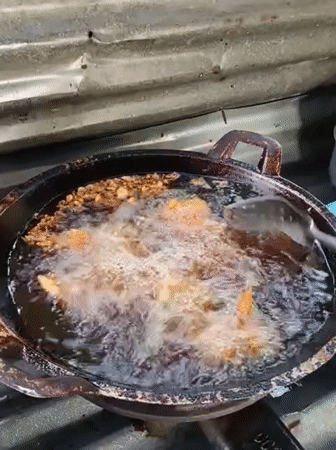 Late-night cooking captured in Lhokseumawe, Indonesia