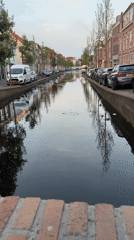 Evening documentation of Delft canals and historic Nieuwe Kerk