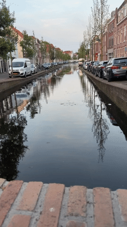 Evening documentation of Delft canals and historic Nieuwe Kerk