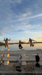 Bridge jumpers leap into water in General Luna Philippines