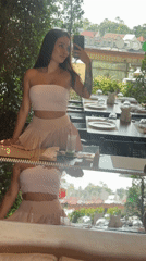Woman takes selfies at Thai restaurant in Choeng Thale