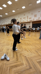 Children's dance practice session documented in Riga facility