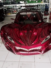 Custom car, trophies, and merch at an Indonesian auto culture spot