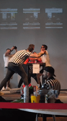 Arm wrestling competition in Romanshorn with multiple matches and referees