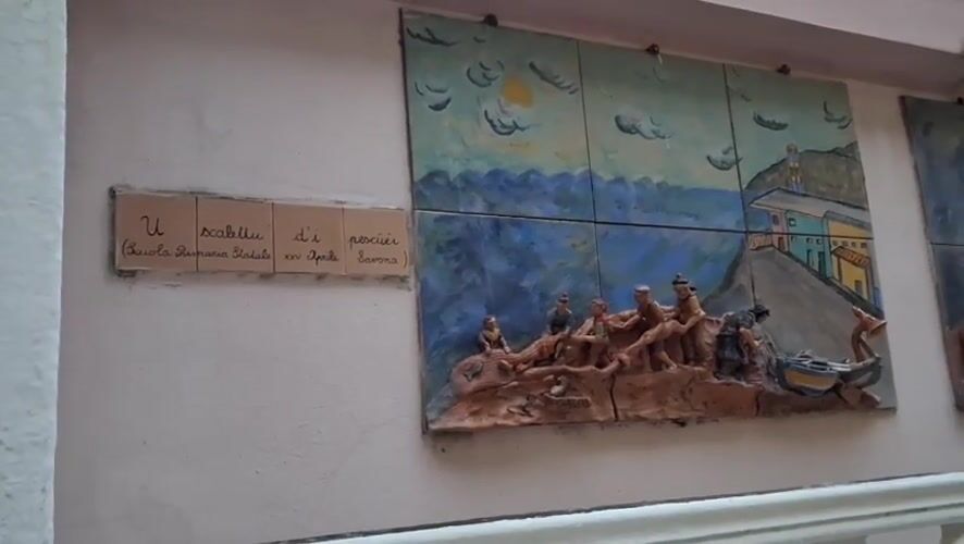 Maritime memorial murals documented along Savona waterfront walls