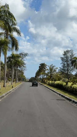 Garuda Wisnu Kencana statue and Bali roads, Uluwatu