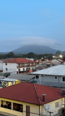 Florianópolis resident documents evening townscape and decorative weather vane