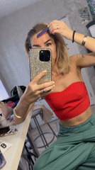 Woman documents beauty routine in Abakan dressing room