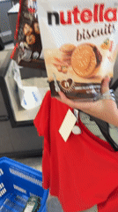Nutella biscuits and a red tee at an Arlington Heights checkout