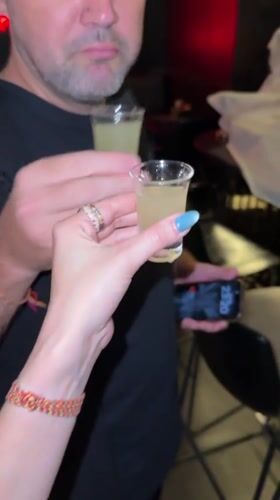 Two people toast with shots at Baan Lamai bar