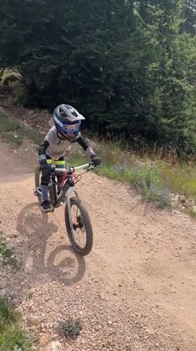 Mountain biking and cable cars at Molveno on a summer morning