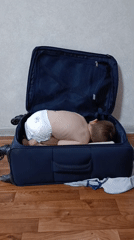 Child found lying in open suitcase in Ufa home