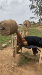 Men use homemade weights for outdoor workout in Nigeria