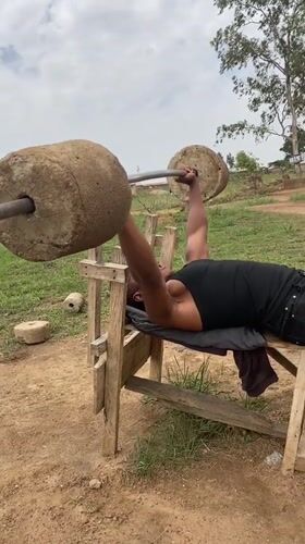 Men use homemade weights for outdoor workout in Nigeria