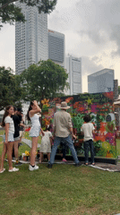 Group spray-paints structure at Singapore park Saturday morning