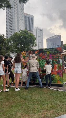 Group spray-paints structure at Singapore park Saturday morning