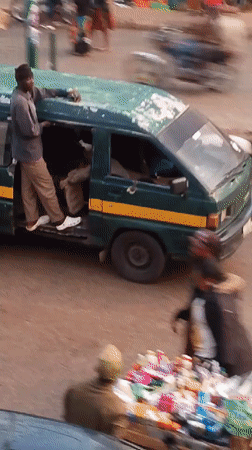 Busy street life documented in Bukuru Nigeria afternoon