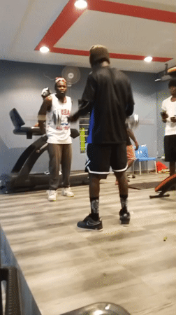 Casual gym session caught mid-workout