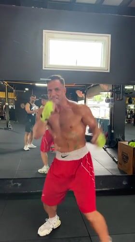 Shadow boxing session at a Chalong gym, all smiles.