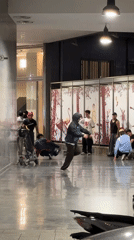 Breakdancers perform in Milan public space