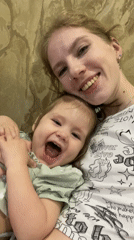 Mother and child share joyful moment in Izhevsk home