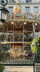 Moscow afternoon scenes: carousel, park visitor, government building documented
