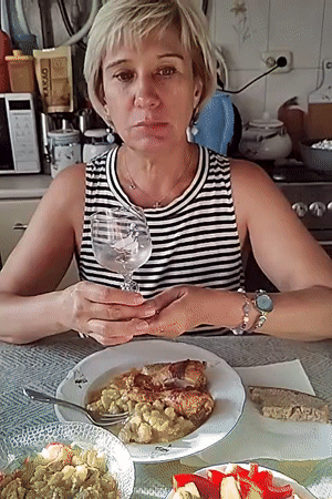 Casual dining scene with a toast over roasted chicken