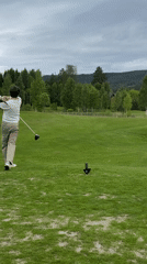 Morning golfer plays under overcast skies in Norway