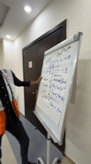 Medical equipment terms on a whiteboard during Gaza training session