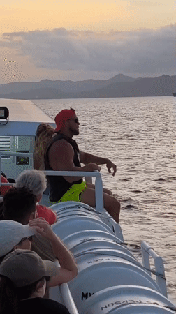 Sunset boat ride with passengers near Karangasem, Indonesia