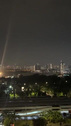 Nighttime cityscape views captured from elevated Kuala Lumpur position
