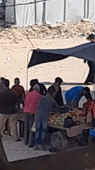 Street cart market activity in al-Qarara, Gaza