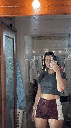 Pre-outing bathroom routine: selfie and sunscreen application