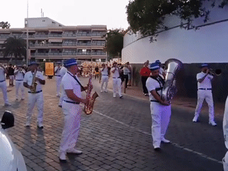 Marching band performs street concert in Maspalomas, Spain
