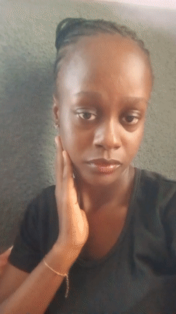 Woman records selfies indoors in Akwanga, Nigeria
