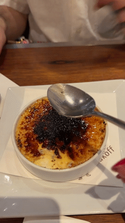 Diner breaks crème brûlée crust at Paris restaurant