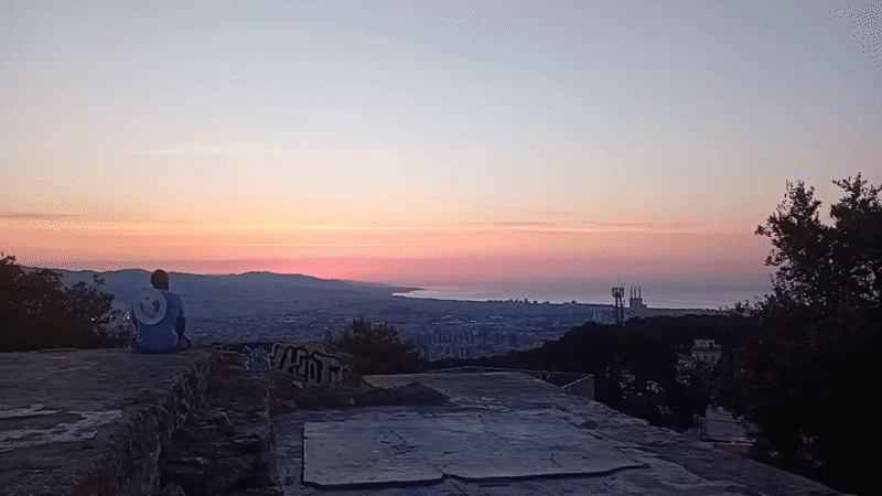 Sunrise over Barcelona from a hilltop perch