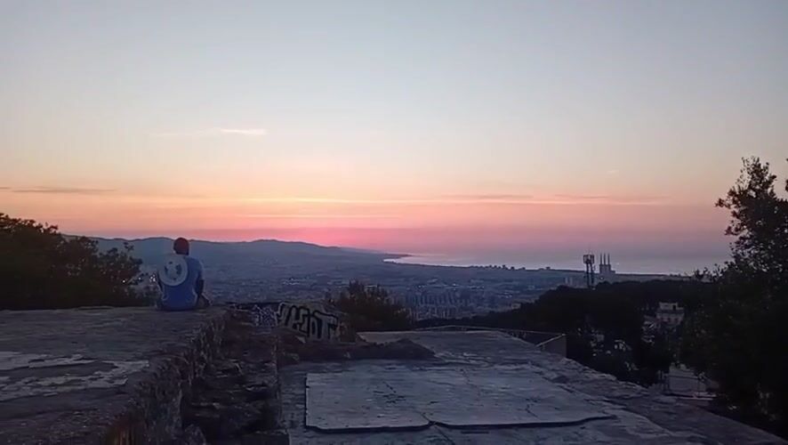 Sunrise over Barcelona from a hilltop perch