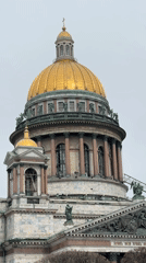 Tourist documents Saint Isaac's Cathedral during morning visit in Saint Petersburg